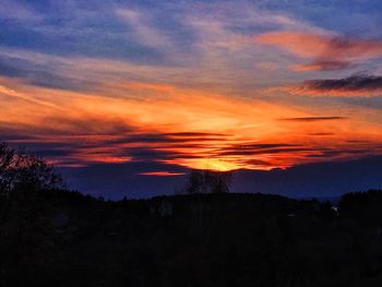 Scenic view of dramatic sky during sunset