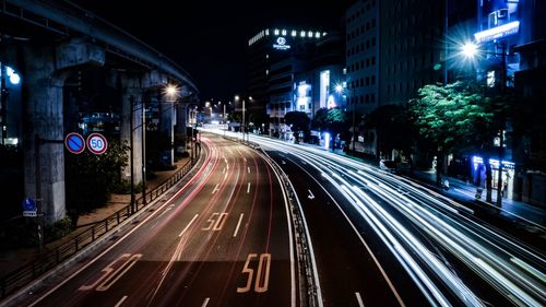 Light trails on city street at night