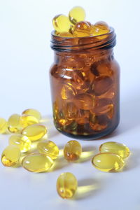 Close-up of drink in glass jar on table