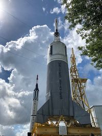 Low angle view of building against cloudy sky