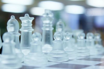 Close-up of chess pieces on board