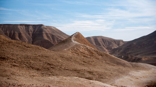 Scenic view of rocky mountains against sky