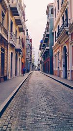 Narrow alley along buildings