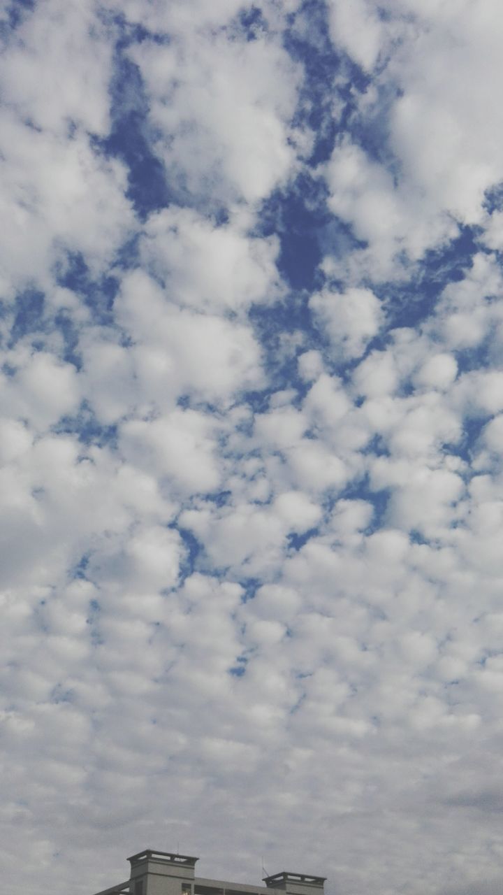 sky, low angle view, cloud - sky, architecture, built structure, building exterior, cloudy, cloud, day, outdoors, nature, no people, high section, beauty in nature, overcast, weather, cloudscape, white color, tranquility, building