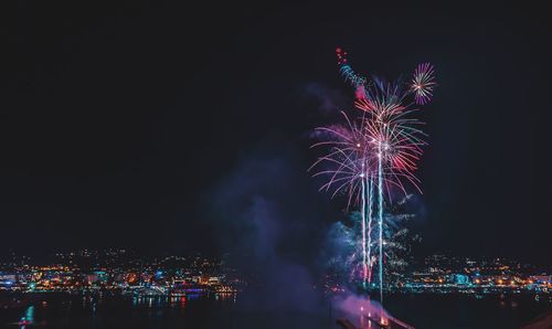 Firework display at night