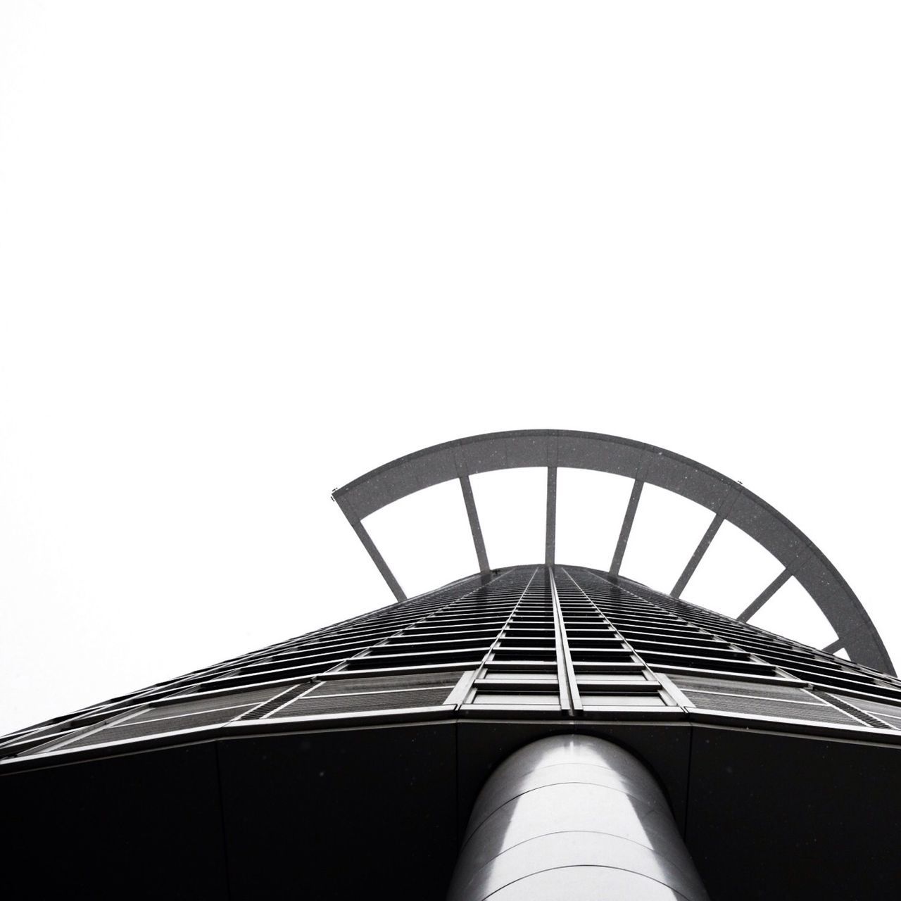 architecture, built structure, low angle view, building exterior, clear sky, copy space, modern, building, city, high section, office building, tower, directly below, part of, sky, day, tall - high, window, no people, outdoors