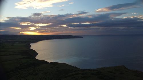 Scenic view of sea at sunset