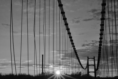 Suspension bridge at sunset