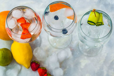 High angle view of fruits on glass table