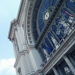 Low angle view of buildings in city against sky