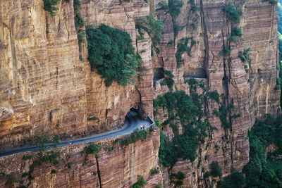 High angle view of road and tunnel on rocky mountain