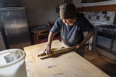 Man working on table at home