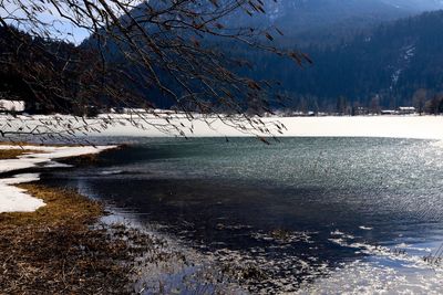 Scenic view of frozen lake against sky