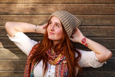 Portrait of young woman in hat