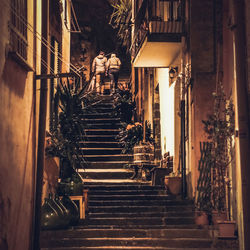 Low angle view of illuminated steps in building