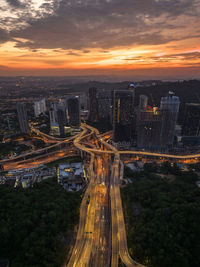 High angle view of city at sunset