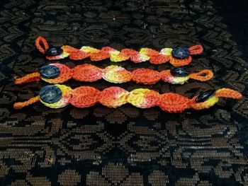 High angle view of multi colored candies on table