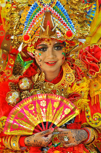 Woman with multi colored umbrellas