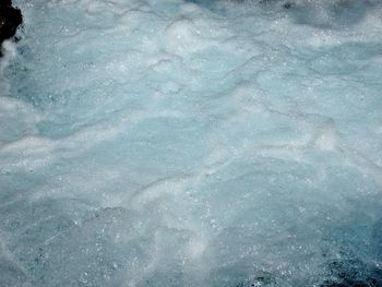 Full frame shot of blue water in swimming pool