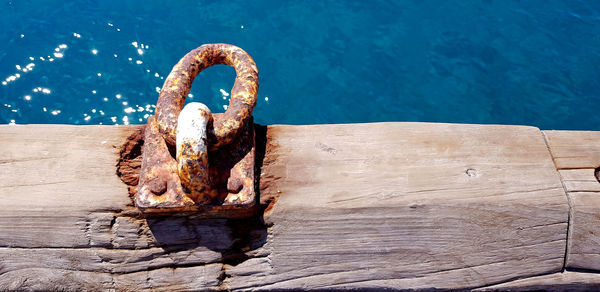 High angle view of rusty wood in swimming pool