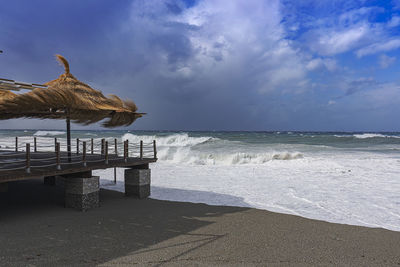 Scenic view of beach against sky
