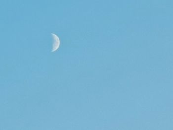 Low angle view of moon in sky