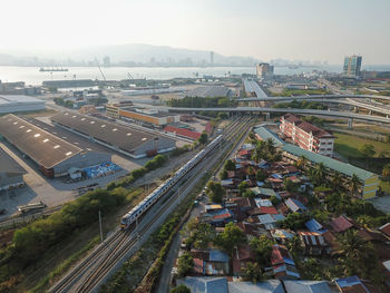 High angle view of street amidst buildings in city