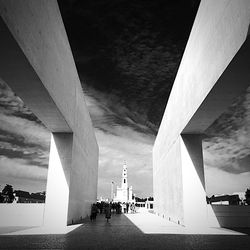 View of bridge against cloudy sky