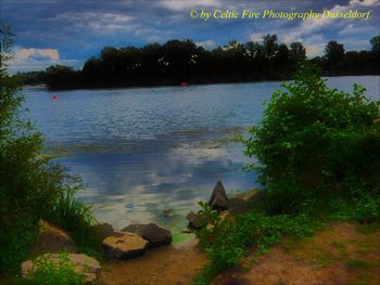 Scenic view of lake against sky