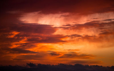 Low angle view of dramatic sky during sunset