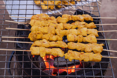 Close-up of meat on barbecue grill