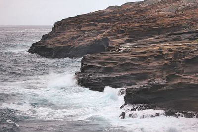 Scenic view of rocks in sea