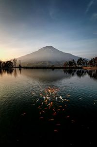 Scenic view of lake against sky during sunset, indonesia landscapes