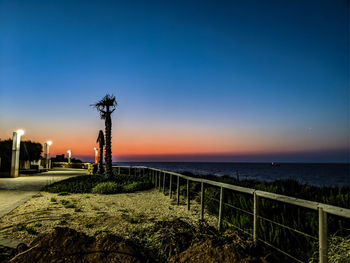 Scenic view of sea against sky at sunset