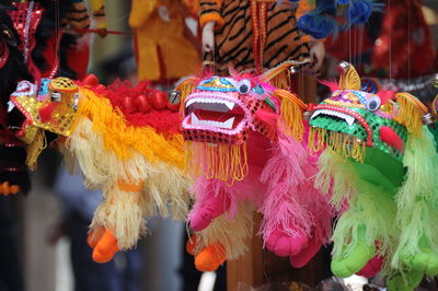 Close-up of multi colored puppet for sale in market