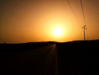 Road against sky during sunset