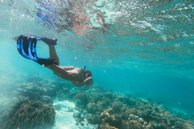 Woman snorkeling in sea