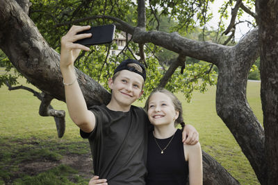 Brother and sister having selfie