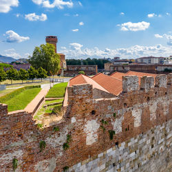 View of old building in city against sky