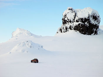 Suv exploring langjokull glacier in iceland