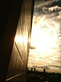 Close-up of city against sky during sunset