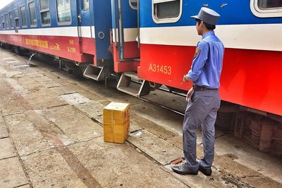 Full length of man working on train