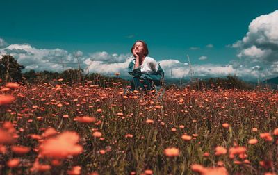 Full length of woman on field against sky