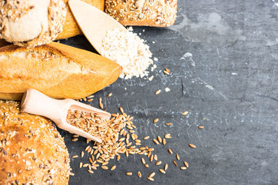 High angle view of wheat and bread