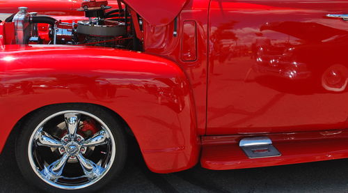 Close-up of red vintage car