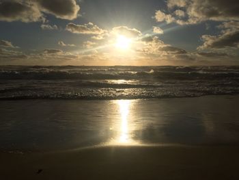 Scenic view of sea at sunset