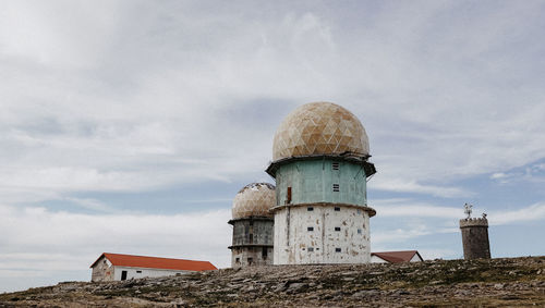 Low angle view of lighthouse against sky