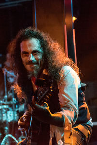 Young man playing guitar