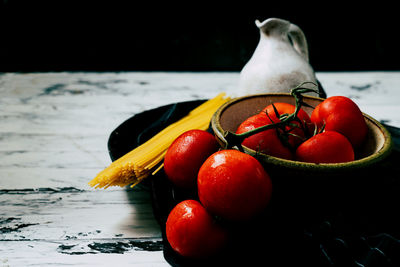 Close-up of fruits in plate on table