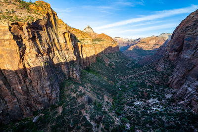 View of rocky mountains against sky